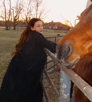 Sarah Klang with a horse