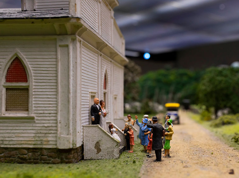 A wedding party leaving a church.