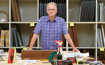 Portrait of Dale Luce in the Carnegie Museum of Art's framing room.