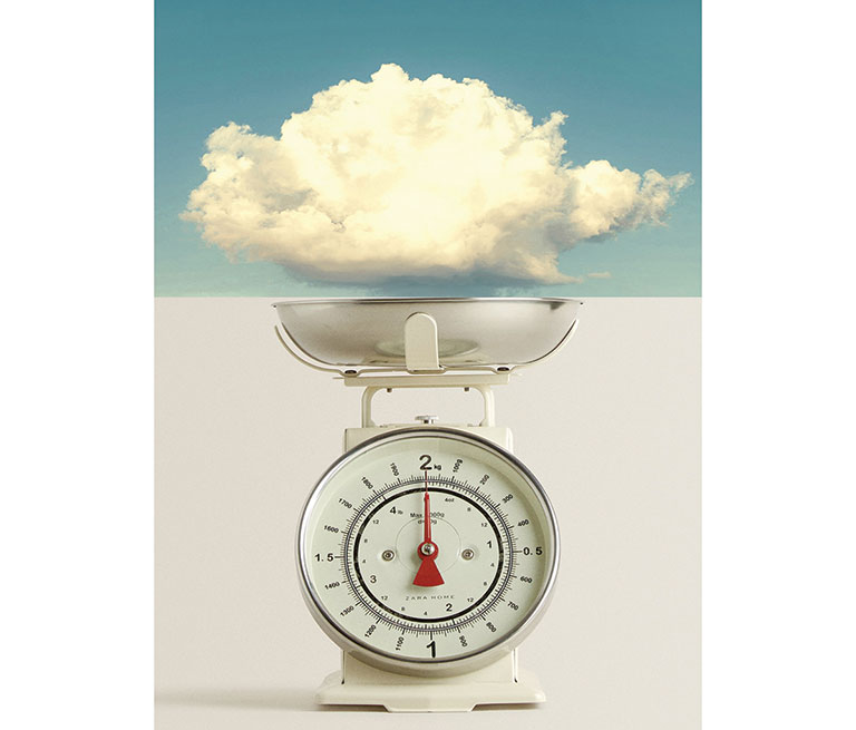 A large cloud sitting on top of a scale.