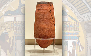 An ancient Egyptian beer mug made of clay.