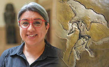 A woman next to a photo of a fossil.