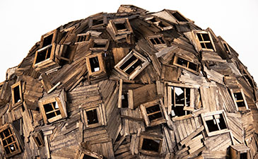 A detail of a large wooden sphere