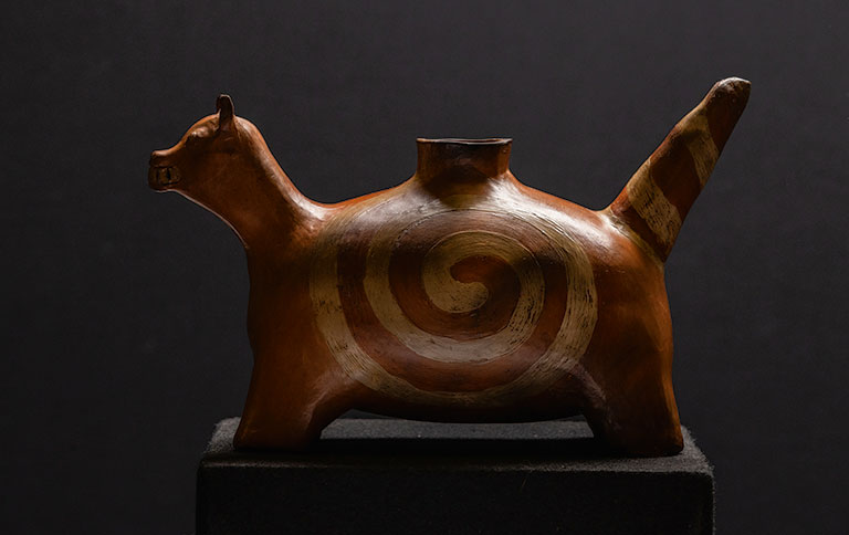 A dog effigy pot.
