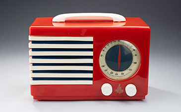 A red vintage radio from the 1940s