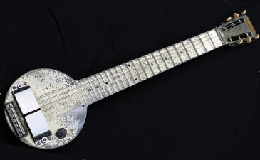 A vintage electric guitar made from aluminum.