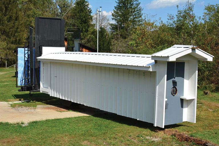 A white building used for testing bird crashes