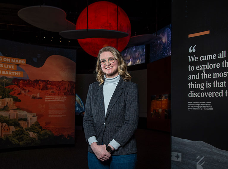 A portrait of Hope Gillespie in the Mars Exhibition at the science center.
