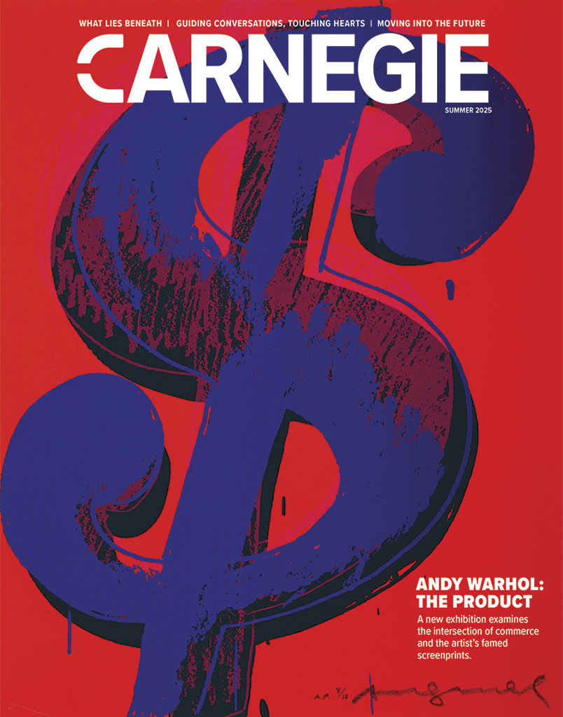 Carnegie magazine cover featuring a bold, red background with a prominent dollar sign and the title "Andy Warhol: The Product." Summer 2025 edition.
