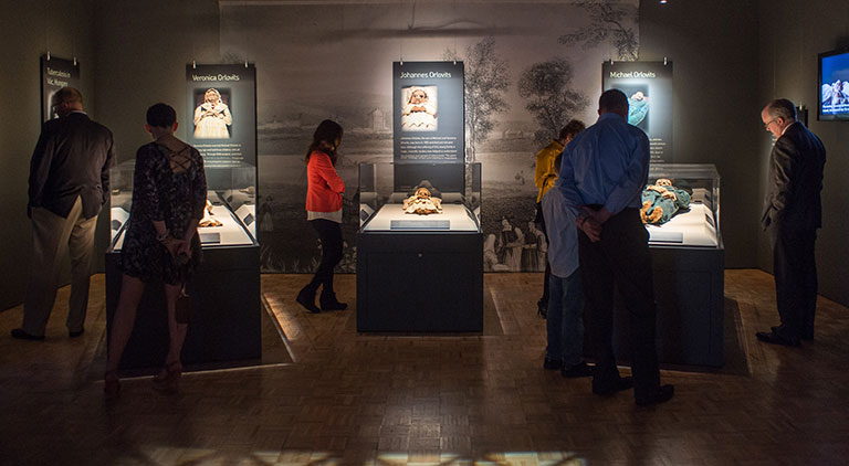 People exploring a museum exhibit.